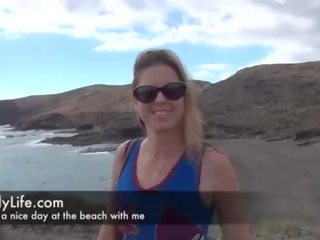 Amateur MILF masturbating at the beach with a lover